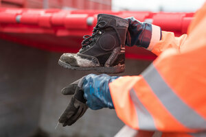 Unbrauchbarer Schuh, kaputter Schuh