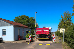 Bauschuttdeponie, Deponiewärter, Kontrolle, Leiter, Waage, LKW, Anlieferung, Abrollcontainer, ARC, Betriebsgebäude, Lastkraftwagen